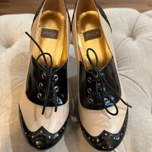 N.Y.L.A. Two-Tone Lace-Up Brogue Flats in Black and Cream